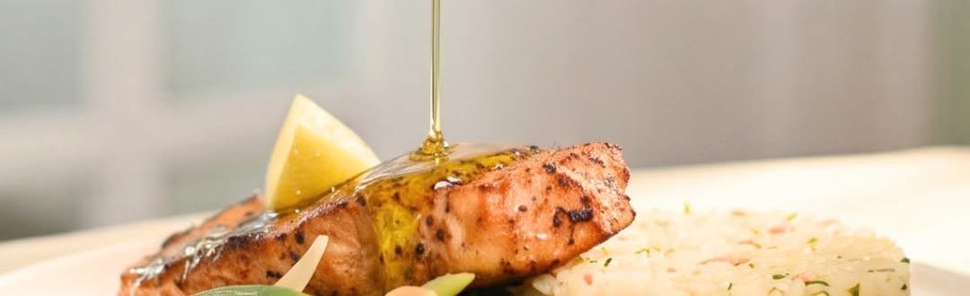 Grilled salmon with rice and a herb sauce